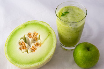 Blended green smoothie with Granny Smith Apple, Honeydew Melon