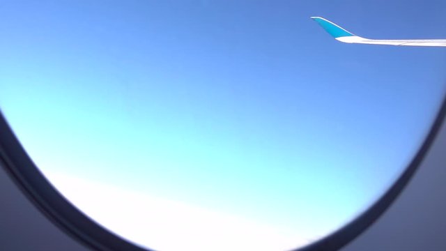 blue sky views outside airplane window