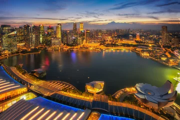 Schilderijen op glas Singapore city and Marina Bay at Twilight time  © iamdoctoregg