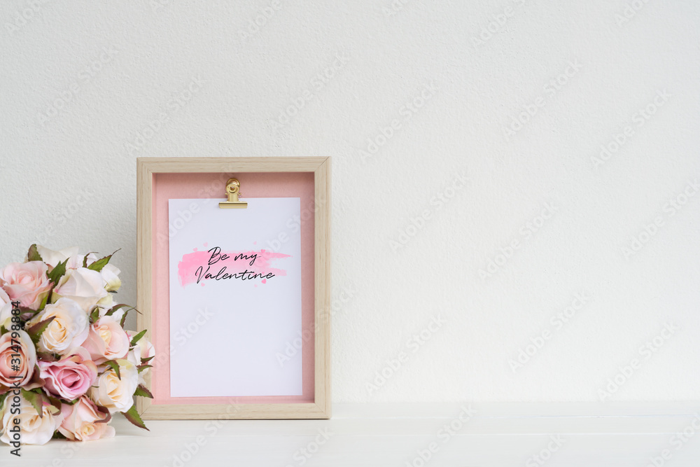 Poster mockup picture frame and pink roses. valentines day background concept with copy space. mock up with
