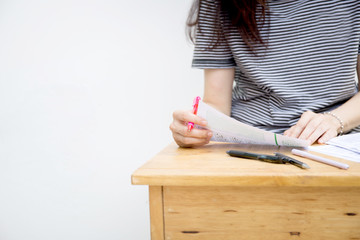 high school,university student study.hands holding pencil writing paper answer sheet.sitting lecture chair taking final exam attending in examination classroom.concept scholarship for education abroad