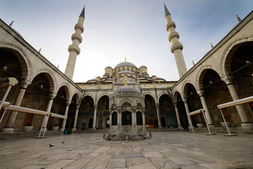 Monumental courtyard with two minarets and ablution fountain at the New Mosque Istanbul