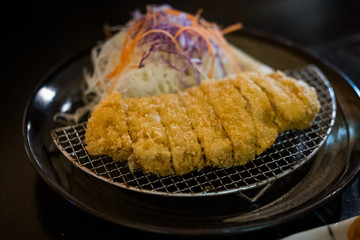 Tonkatsu, Breaded pork cutlet,  Japanese food, dark background 