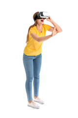 Young woman with virtual reality glasses on white background