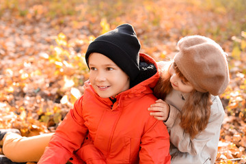Cute little children in autumn park