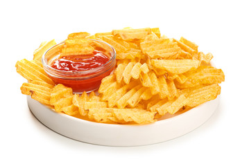 Plate with tasty potato chips and sauce on white background