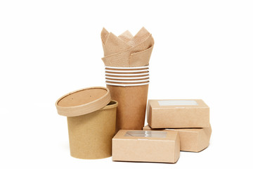 Eco kraft paper tableware. Paper cups, dishes, fast food containers, paper napkins isolated on white background. Recycling concept. Zero waste.