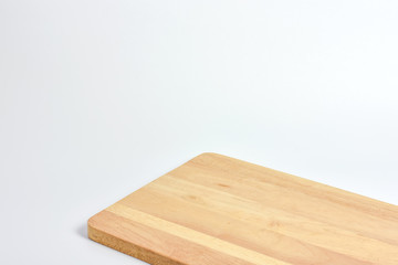 Wooden cutting board isolated on white background.