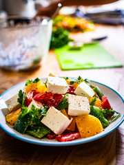  Fresh greek salad on wooden background
