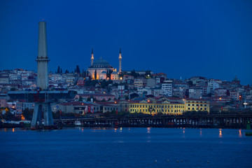 Fototapeta premium Yavuz Selim Mosque Istanbul at dawn with construction to replace Ataturk Bridge over the Golden Horn