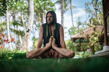 Man practice Yoga practice and meditation outdoor