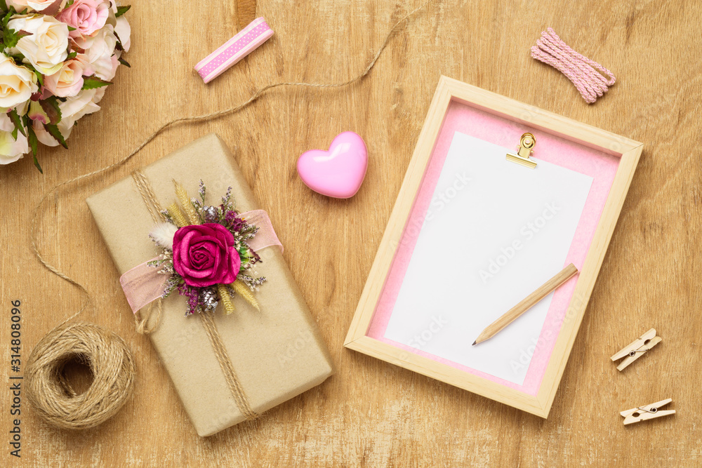 Poster mockup blank photo frame for valentines day concept. top view of mock up photo frame with beautiful 