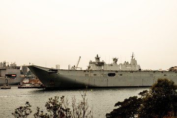 A dramatic shot of the Australian navy battleship at the Sydney Harbour