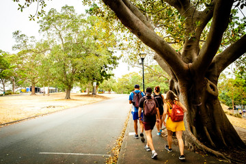 Highschool students were walking in the park