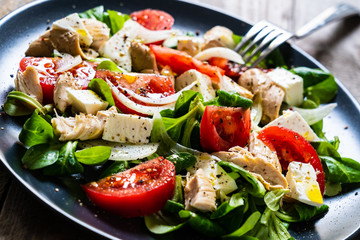 Tasty salad - vegetables , feta cheese and barbecue chicken fillet