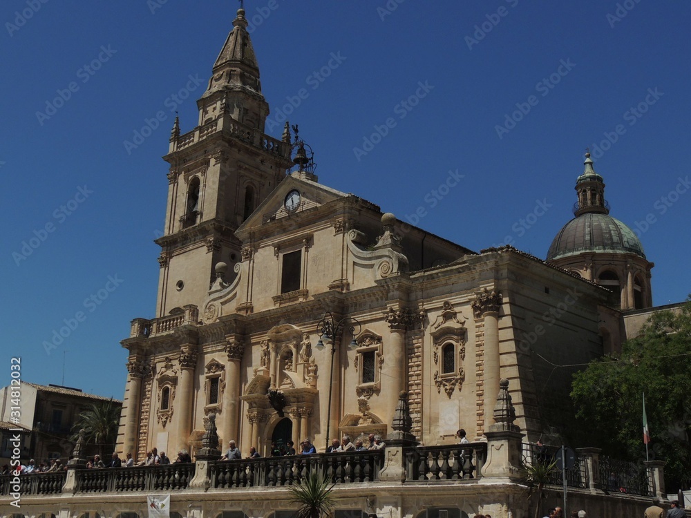 Wall mural ragusa – cathedral of san giovanni facade in baroque style with bell tower, solar sundial, dome and 