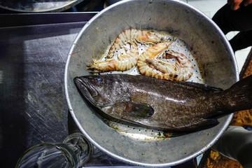 Marsa Matrouh, Egypt Fresh fish and shrimp selected in a restaurant for cooking.