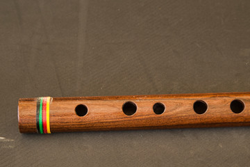 quena (from Quechua quena) traditional wind instrument used by the inhabitants of the central Andes.Peru, made with llama bone