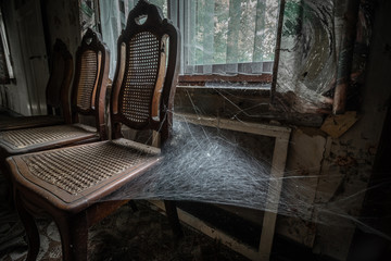 An old, small abandoned house somewhere in Belgium