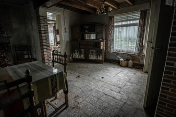 An old, small abandoned house somewhere in Belgium