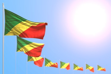 nice many Congo flags placed diagonal with bokeh and free space for your content - any feast flag 3d illustration..