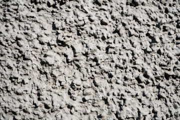Texture photo of white rough concrete plaster