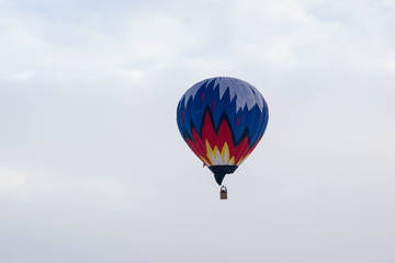 The hot  air baloons fest in Russia. Apples on the snow. Colorfull balloons in the winter skye