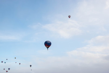The hot  air baloons fest in Russia. Apples on the snow. Colorfull balloons in the winter skye