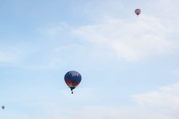 The hot  air baloons fest in Russia. Apples on the snow. Colorfull balloons in the winter skye