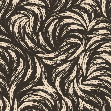 Seamless texture on a brown background from beige torn arches. A pattern of beige strokes of paint on a dark background for prints and wrapping paper.