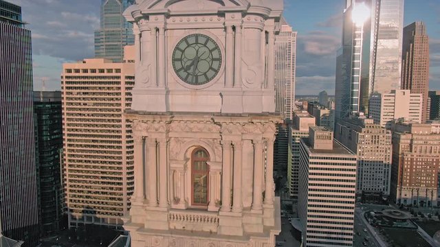 Aerial: Philadelphia City Hall and statue of William Penn over the city skyline. Philadelphia, Pennsylvania, USA. 24 August 2019