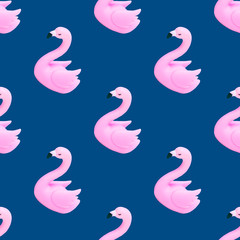 Patern of pink flamingos on classic blue colored background