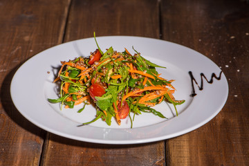 Salad with carrots and fresh vegetables