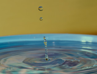 water drop macro on the water surface