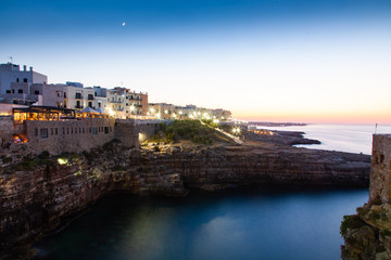 Fototapeta premium night city view of Polignano a Mare Apulia Italy