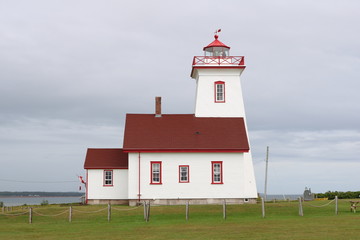 Fototapeta na wymiar Wood Islands Lighthouse PEI Culture Side Red White