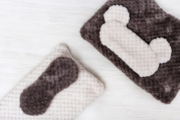 Pillow and Eye mask for sleeping on white background. Healthy sleep. Top view. Flat lay.