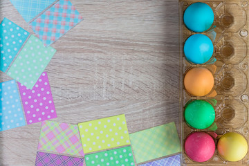 Easter Egg Dying Process.  Colored eggs , top view. Holiday backgeound with copy space