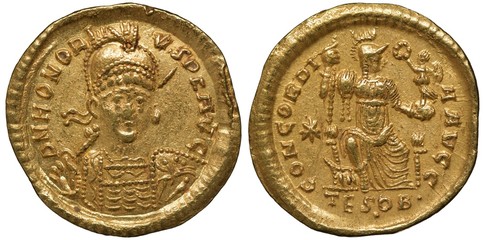 Ancient Roman Empire golden coin solidus 408-423 AD, armored and helmeted bust of Emperor Honorius...