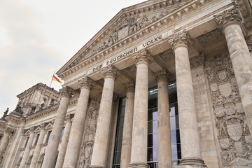 Reichstag building, seat of German Parliament (Deutscher Bundestag). Horizontal photo of colorful clean European city of Berlin, daytime cloudy sky, month of may travel in tourist place