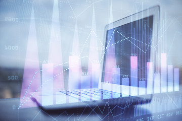 Forex Chart hologram on table with computer background. Double exposure. Concept of financial markets.