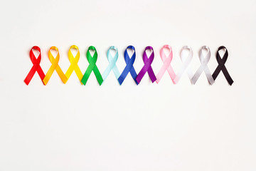 World cancer day concept, February 4. Colorful awareness ribbons on white background. Copy space for text