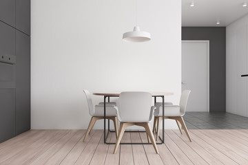 White and gray dining room and kitchen