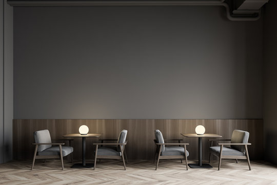 Modern gray restaurant interior with armchairs