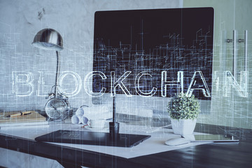 Double exposure of blockchain theme hologram and table with computer background. Concept of bitcoin...