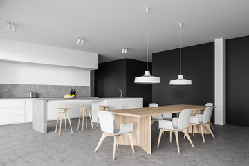 White and gray kitchen corner with bar and table