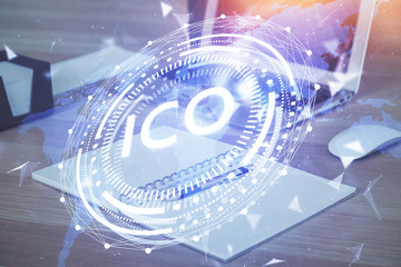 Double exposure of blockchain theme hologram and table with computer background. Concept of bitcoin...