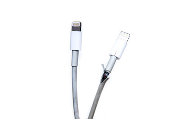 The broken and frayed cable from the charger for the smart phones. Typical problem of the users....