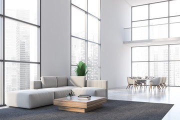 White living room and dining room corner