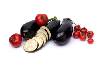 Eggplant with small tomatoes. Eggplants isolated on white background with tomatoes..